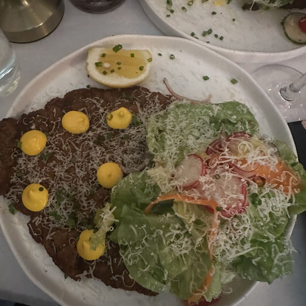 Palermo NYC Argentinian Bistro - NY Strip Milanese with salad - Argentine Near Me - New York, New York Palermo NYC Argentinian Bistro - NY Strip Milanese with salad - Argentine Near Me - New York, New York