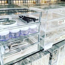 MUJI - Their acrylic storage containers are the best! Perfect for storing makeup.