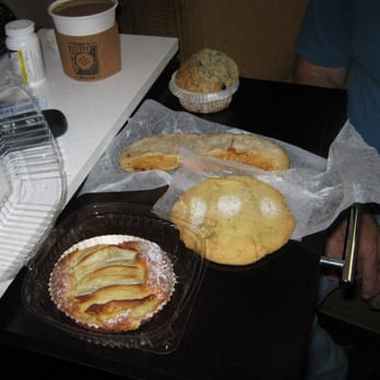 Amy's Bread - From back to front: Blueberry Muffin, Prosciutto & Black Pepper Twist, Orange Butter Cookie, Apple Tart - Bakeries Near Me - New York, New York