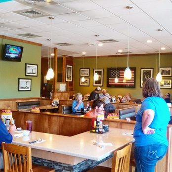 Country Pride - the main dining room welcoming you very inviting coming out of the travel store by the bathrooms and entrance - American Near Me - Candler, North Carolina