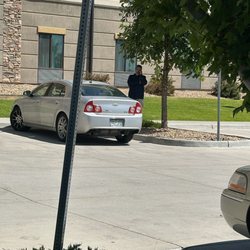 Comfort Suites Loveland - Racist Maintenance Worker. I'm not sure what me sitting in my car has to do with his job...