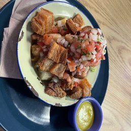 Weekly special: crispy pork belly on yucca Weekly special: crispy pork belly on yucca