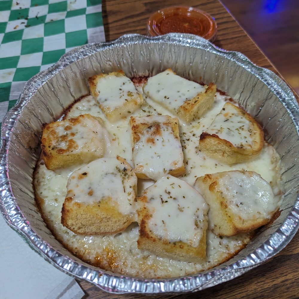Cheesy Bread with an added side of Marinara Cheesy Bread with an added side of Marinara