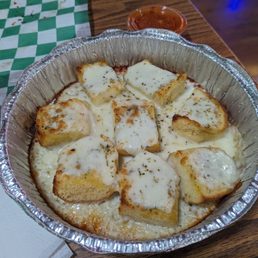 Cheesy Bread with an added side of Marinara Cheesy Bread with an added side of Marinara
