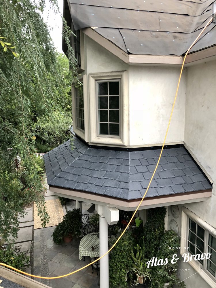 Slide of Alas & Bravo Roofing Company