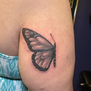 Dark Nouveau Tattoo - My best friend's half of a monarch representing me in California. - Tattoo Near Me - Bend, Oregon Dark Nouveau Tattoo - My best friend's half of a monarch representing me in California. - Tattoo Near Me - Bend, Oregon