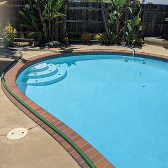 Pure Water Industries - green hose is the inlet to the trailer and the blue is the clean return water - Pool Cleaners Near Me - Escondido, California Pure Water Industries - green hose is the inlet to the trailer and the blue is the clean return water - Pool Cleaners Near Me - Escondido, California