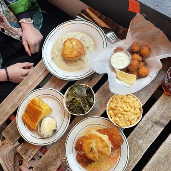 Pies 'n' Thighs - Above - Biscuits & Gravy Below - Chicken Biscuit Inbetween - Smoked Pork Collard Greens, Cornbread, Hush Puppies with Tartar - Southern Near Me - Brooklyn, New York