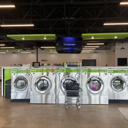 The Wash House - Washers and clean floor as you walk in. A/C running.