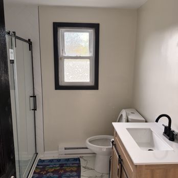 R Justo Construction - After pic of downstairs bathroom - General Contractors Near Me R Justo Construction - After pic of downstairs bathroom - General Contractors Near Me