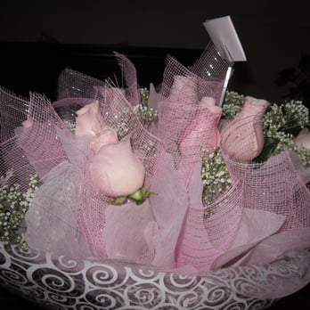 Creative Floral Designs - HK bouquet with the ugly and messy mesh and the lite glitter dust ..... disappointing - Floral Designers Near Me - San Gabriel, California Creative Floral Designs - HK bouquet with the ugly and messy mesh and the lite glitter dust ..... disappointing - Floral Designers Near Me - San Gabriel, California