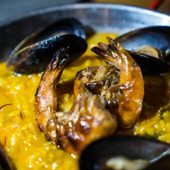 Thursday Kitchen - seafood paella - it is super yellow/orange.. - Korean Near Me - New York, New York