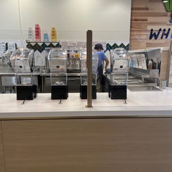 Jamba - a counter with a variety of food items - Juice Bars & Smoothies Near Me - Milwaukee, Wisconsin