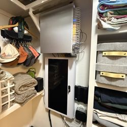 A fresh UniFi network in a bedroom closet.