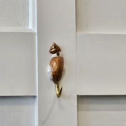 Adorable hooks on the walls. It's all in the details. Adorable hooks on the walls. It's all in the details.