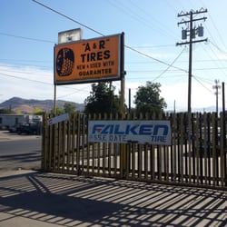 A & R Tire Shop - If you're on date st you can't miss the bright yellow sign.