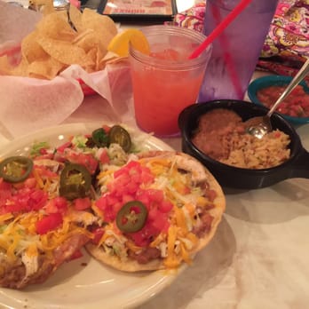 Chuy's - Chips & salsa; Chicken Chalupas a la carte; Green Chile Rice & Beans; Kings Punch - Tex-Mex Near Me - Kissimmee, Florida
