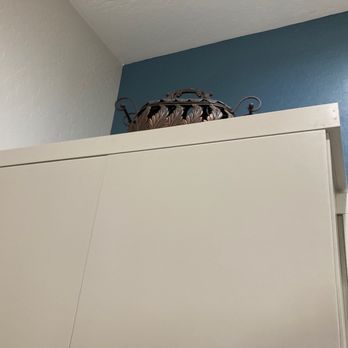 Stradling's Cabinets & Remodeling - This picture shows unaligned cabinet. The doors extend beyond the top trim. Owner told us they don't. "It's an illusion." He said. - General Contractors Near Me - Gilbert, Arizona Stradling's Cabinets & Remodeling - This picture shows unaligned cabinet. The doors extend beyond the top trim. Owner told us they don't. "It's an illusion." He said. - General Contractors Near Me - Gilbert, Arizona