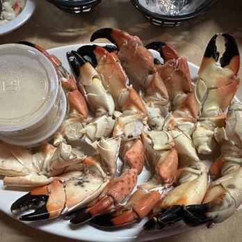 Catfish Deweys - a plate of crab legs and claws - Seafood Near Me - Oakland Park, Florida Catfish Deweys - a plate of crab legs and claws - Seafood Near Me - Oakland Park, Florida