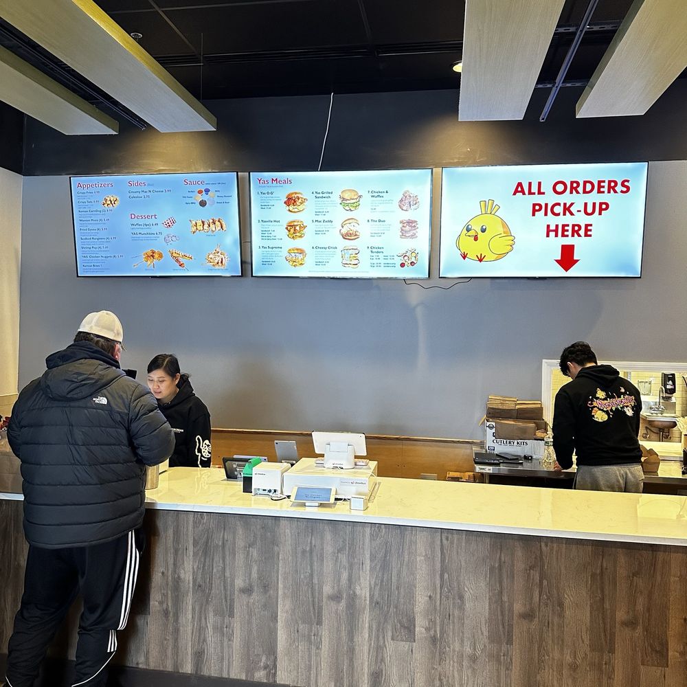 YAS Chicken - customers at the counter - Chicken Wings Near Me - Burlington, Massachusetts YAS Chicken - customers at the counter - Chicken Wings Near Me - Burlington, Massachusetts