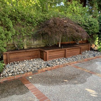 Trujillo’s Services - Retaining wall of pressure treated wood - Fences & Gates Near Me Trujillo’s Services - Retaining wall of pressure treated wood - Fences & Gates Near Me