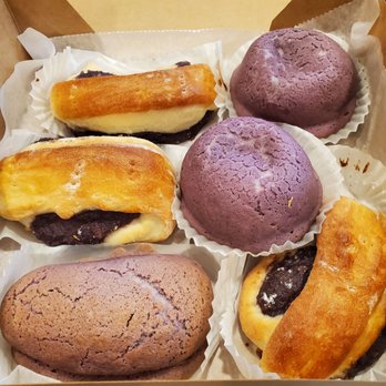 Coffee Lab & Roasters Evanston - Three ube buns, ube turtle bread (bottom left), Kopi Roti buns (top right). - Coffee & Tea Near Me - Evanston, Illinois