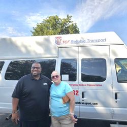TCF Reliable Transport - Jermaine King with client after Ambulatory transportation.