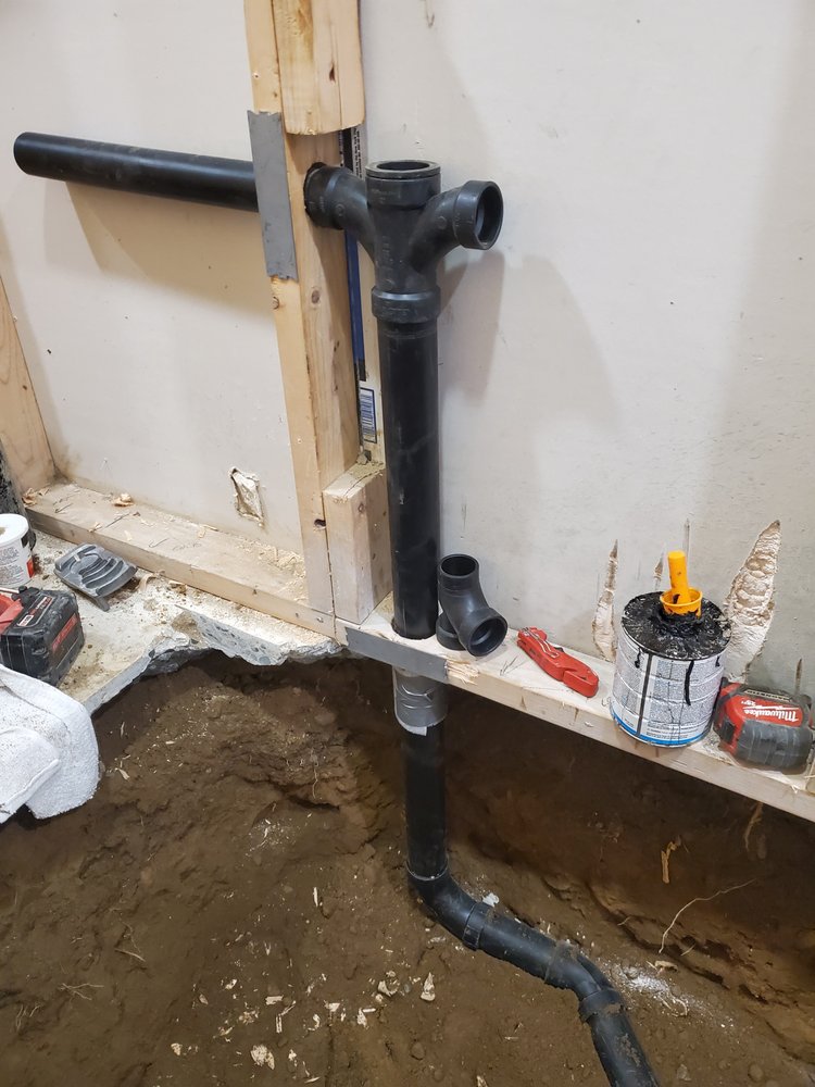 Slide of TP Plumbing & Drains