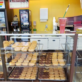 Donut Wheel - a variety of doughnuts in a display case - Donuts Near Me - Hurst, Texas