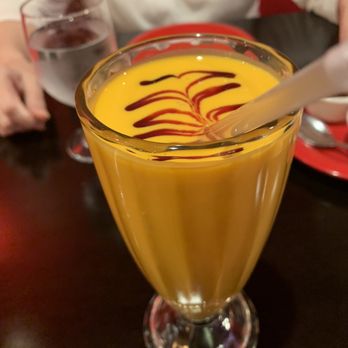 Curry Mantra - a bowl of soup with a spoon in it - Indian Near Me - Fairfax, Virginia Curry Mantra - a bowl of soup with a spoon in it - Indian Near Me - Fairfax, Virginia