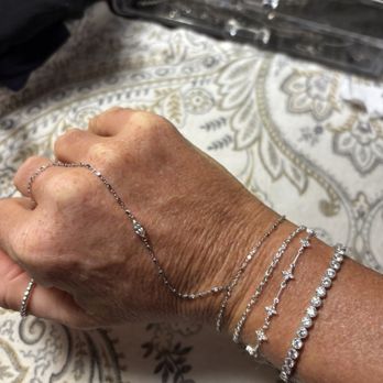 Jasel Jewelry - Beautiful permanent hand chain, and bracelets and a moissanite tennis bracelet solid silver - Jewelry Near Me - Winter Park, Florida Jasel Jewelry - Beautiful permanent hand chain, and bracelets and a moissanite tennis bracelet solid silver - Jewelry Near Me - Winter Park, Florida