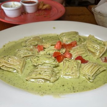 Fritto Misto - "Pillows" in a pesto cream sauce. The sauce nicely adheres to the scores in the pasta. - Italian Near Me - Hermosa Beach, California Fritto Misto - "Pillows" in a pesto cream sauce. The sauce nicely adheres to the scores in the pasta. - Italian Near Me - Hermosa Beach, California