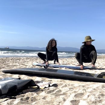 Soul Surf Sessions - Heather and Olyve; stabilizing - Surf Schools Near Me - Manhattan Beach, California Soul Surf Sessions - Heather and Olyve; stabilizing - Surf Schools Near Me - Manhattan Beach, California