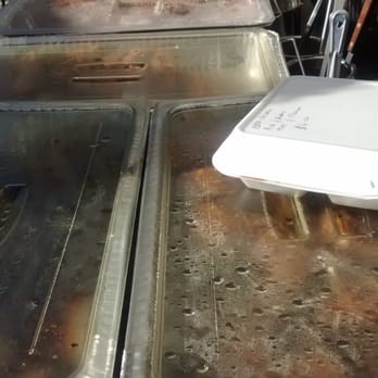 Johnny Kaks International - a line of food being prepared - Food Trucks Near Me - New York, New York