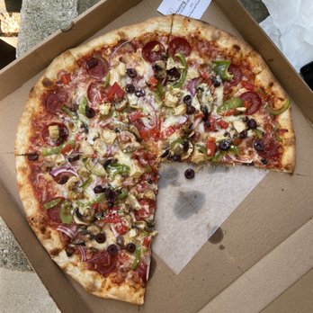 College Pizza - a half eaten pizza in a box - Pizza Near Me - Boston, Massachusetts