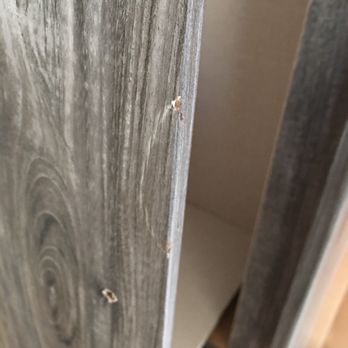 Ashley Store - Chunk about two inches long that looks as if it was glued - Furniture Stores Near Me - Prescott, Arizona
