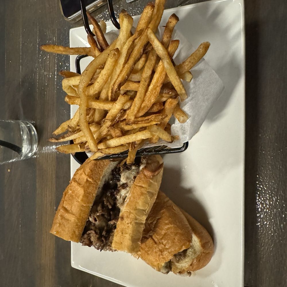 The Stillery - Philly Cheesesteak and fries. - Music Venues Near Me - Goodyear, Arizona The Stillery - Philly Cheesesteak and fries. - Music Venues Near Me - Goodyear, Arizona