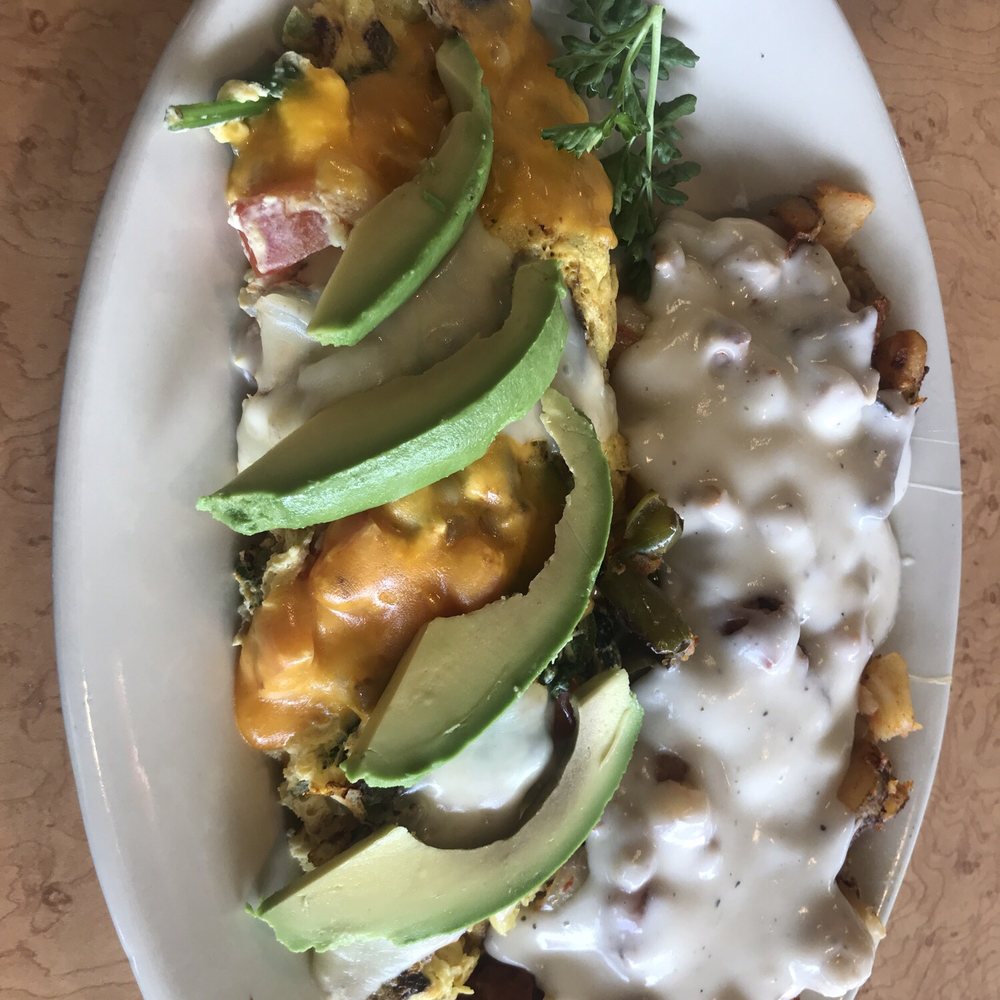 Pegah's Kitchen - Veggie omletttte with Sausage gravy on home fries. - American Near Me - Vista, California Pegah's Kitchen - Veggie omletttte with Sausage gravy on home fries. - American Near Me - Vista, California