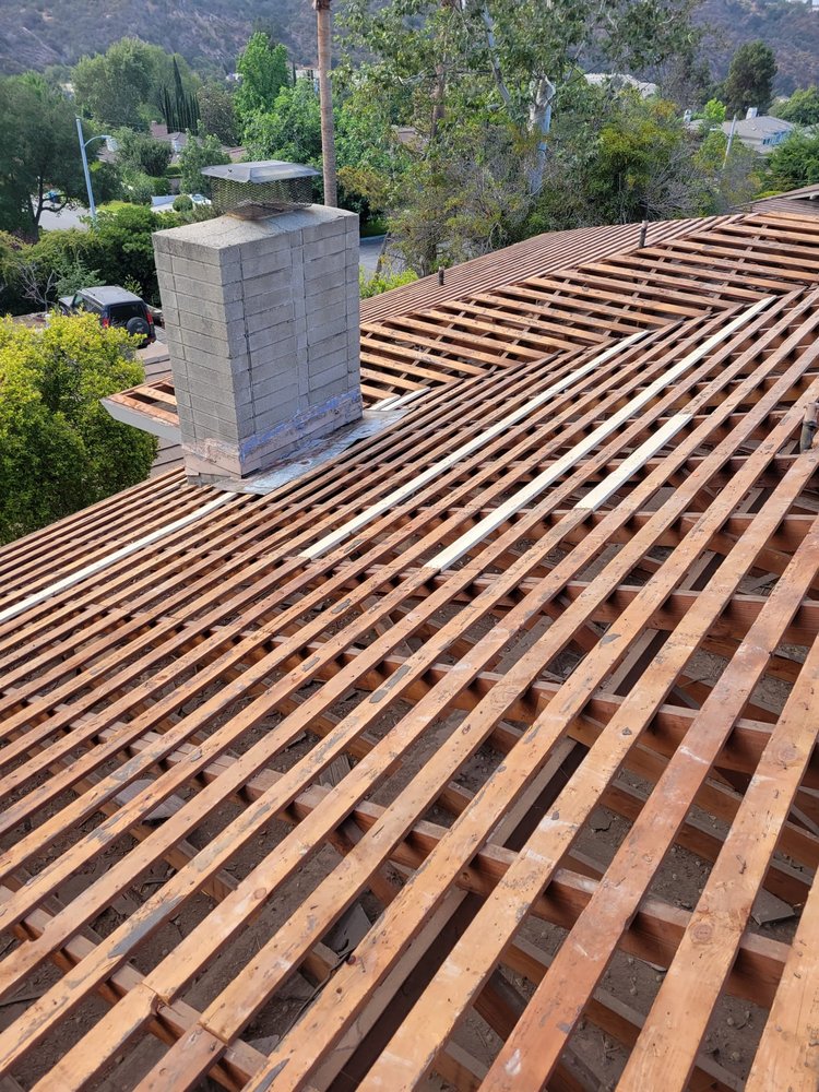 Slide of Tinoco Roofing