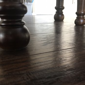 Ashley Store - The front chair leg does not touch the ground. - Furniture Stores Near Me - Wesley Chapel, Florida Ashley Store - The front chair leg does not touch the ground. - Furniture Stores Near Me - Wesley Chapel, Florida