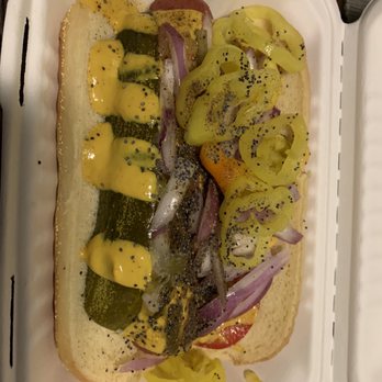 Relished Dog - The Chicago dog; mustard, tomato, onion, a pickle spear, pepperocini peppers and more - Food Trucks Near Me Relished Dog - The Chicago dog; mustard, tomato, onion, a pickle spear, pepperocini peppers and more - Food Trucks Near Me