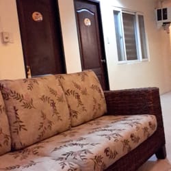 The Suites At Calle Nueva - View of downstairs rooms from common area