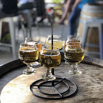 Bottle Logic Brewing - Taster tray on their patio - Breweries Near Me - Anaheim, California Bottle Logic Brewing - Taster tray on their patio - Breweries Near Me - Anaheim, California