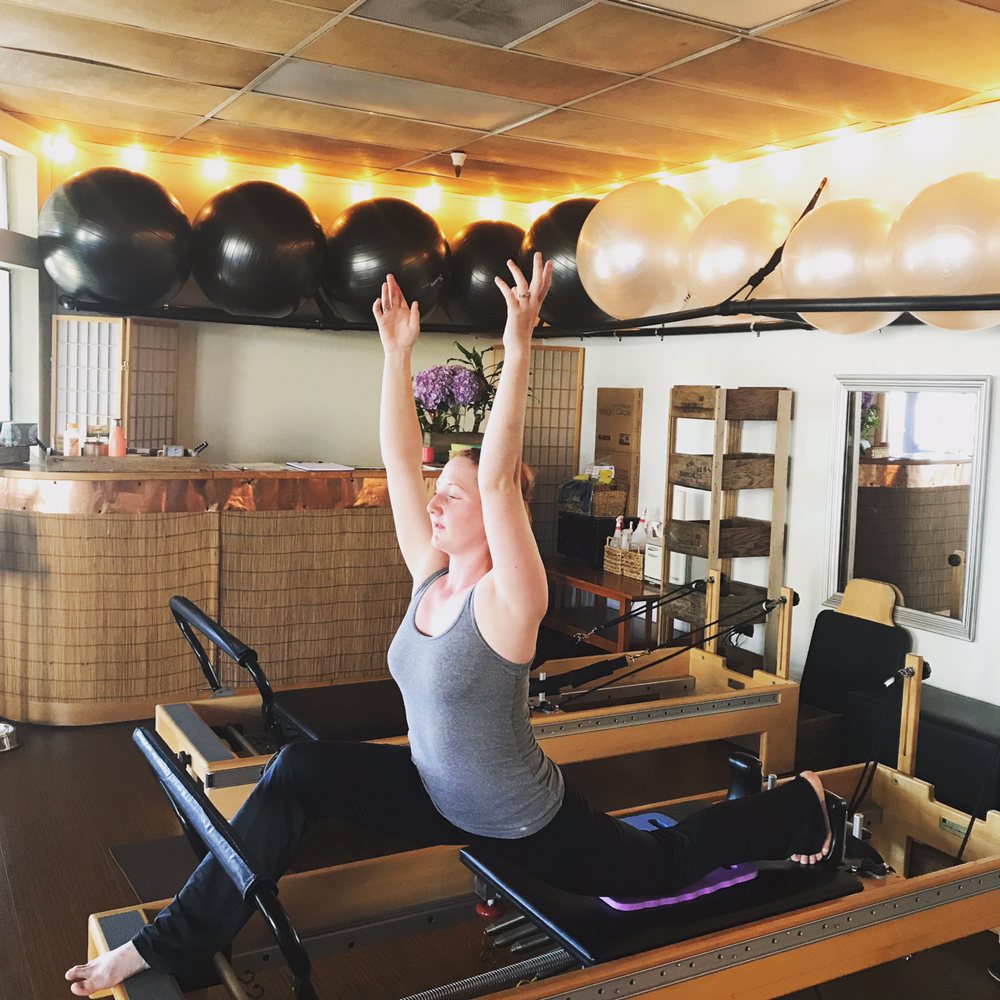 Joy of Movement Gyrotonic and Pilates Studio Logo
