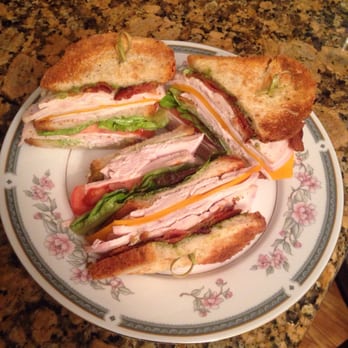 The Beehive - Turkey club dinner & my boyfriend got the chicken caesar wrap. Large portions! - New American Near Me - Armonk, New York The Beehive - Turkey club dinner & my boyfriend got the chicken caesar wrap. Large portions! - New American Near Me - Armonk, New York