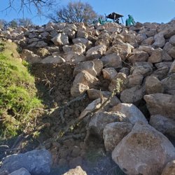 Hammes Roofing & Construction - Erosion control using a fabric base and rocks placed properly