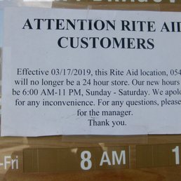 a sign in a store window a sign in a store window