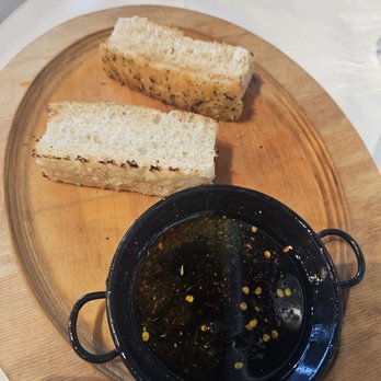 The Wooden Spoon - Took this picture after eating the bread and shocked at how delicious it was! - Caterers Near Me The Wooden Spoon - Took this picture after eating the bread and shocked at how delicious it was! - Caterers Near Me