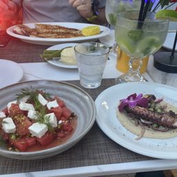 Watermelon and Feta Salad, Grilled Octopus, whole Branzino with side of mashed potatoes and asparagus