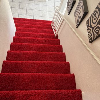 Premier Flooring - red carpeted stairs leading to a bathroom - Flooring Near Me - Las Vegas, Nevada Premier Flooring - red carpeted stairs leading to a bathroom - Flooring Near Me - Las Vegas, Nevada